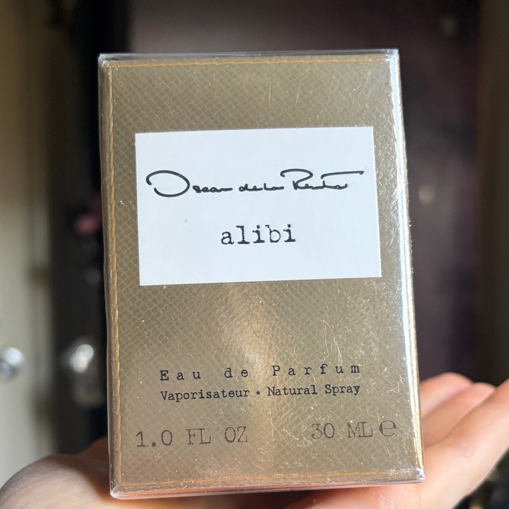Oscar de la Renta Alibi perfume 1oz 30ml